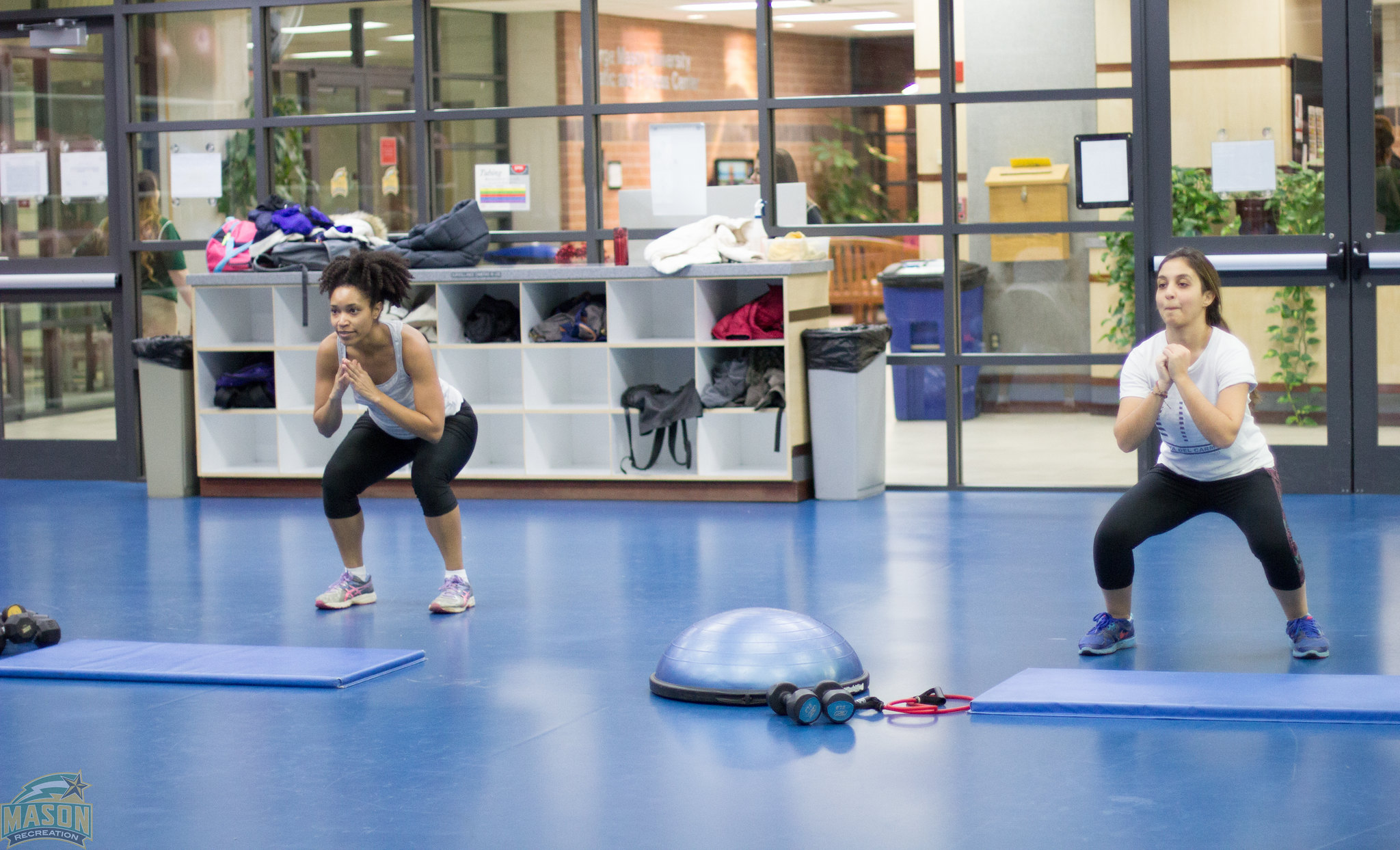 women training with creative fitness